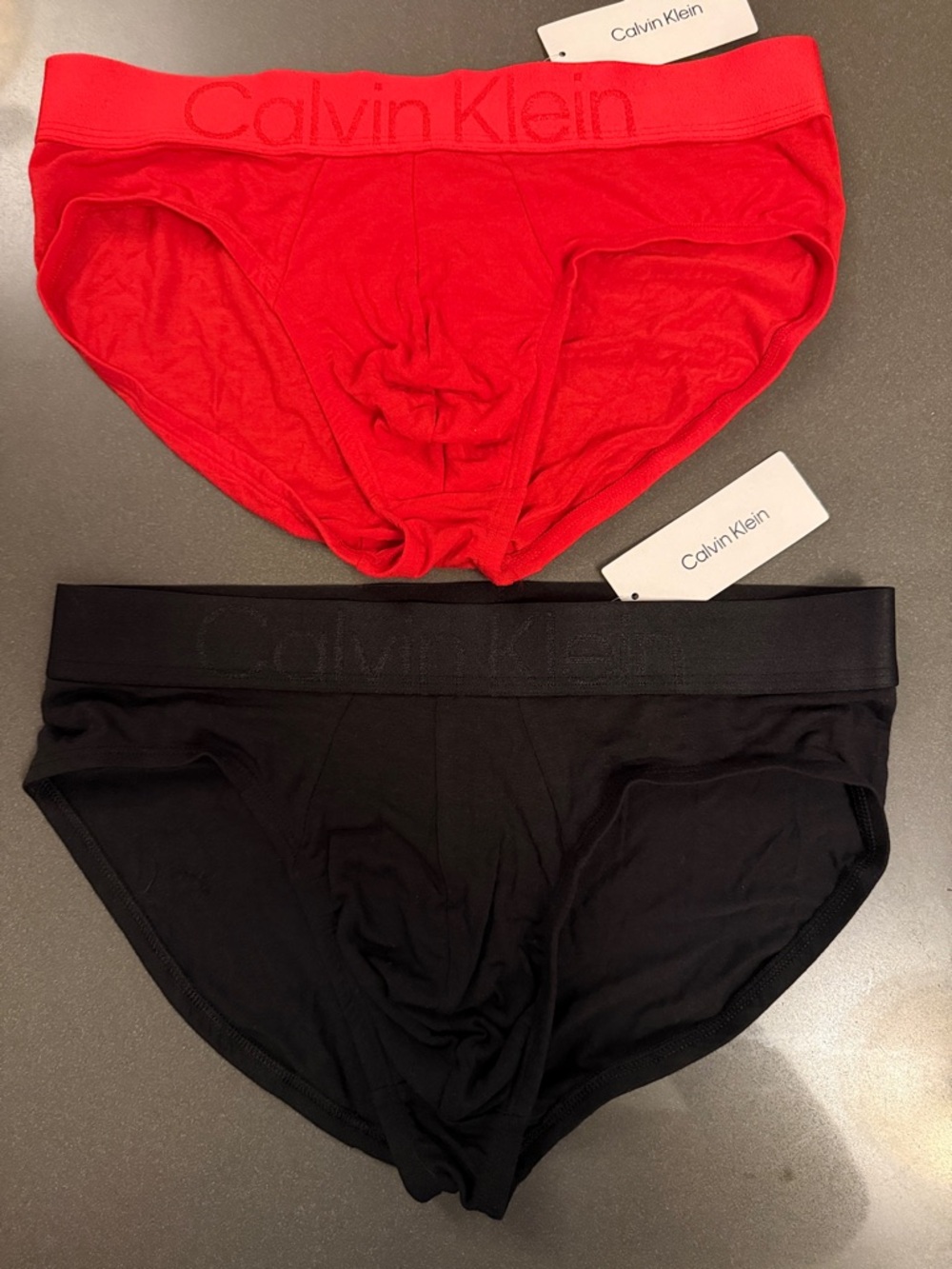 New Calvin Klein Red and Black Men's Hip Briefs Set.  New and never worn.
